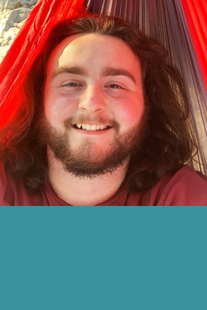 Student with beard in hammock
