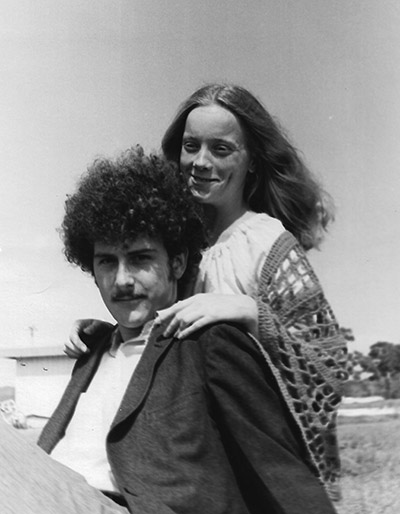 Black and white photo of a young couple on campus