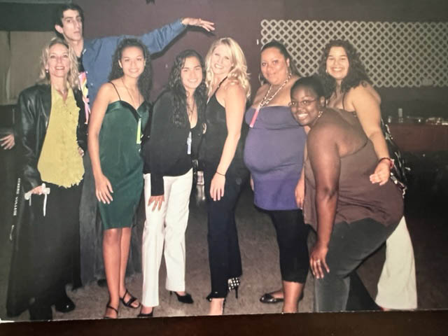 Group of nine students posing