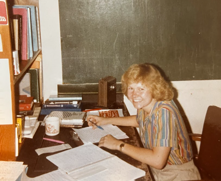 Young woman at desk in office