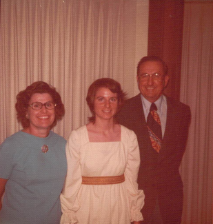 Three people standing side to side