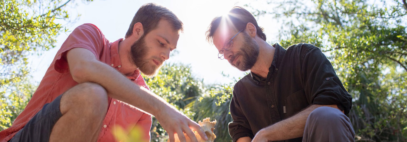 Eckerd anthropology professor Burnett with student and skeleton