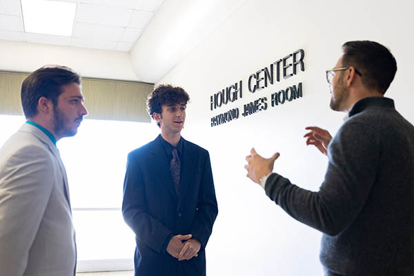 Two Eckerd College students speak with a staff mentor about career exploration