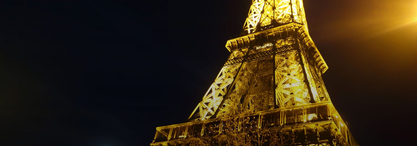 The Eiffel Tower lit up at night, taken by Michael Connelly '16 during the French Language and Culture in Paris Winter Term program