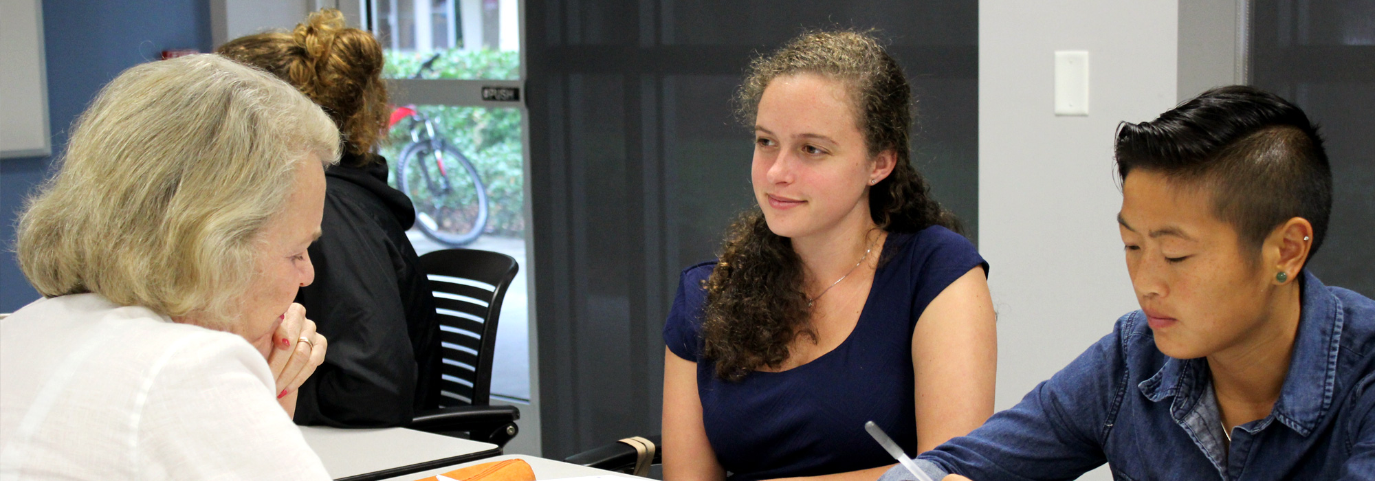 Two students from a Human Development class interview an ASPEC member