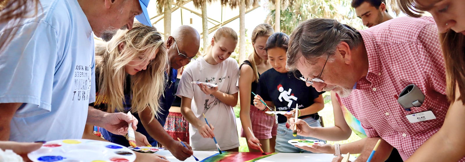 Human Development students paint alongside seniors