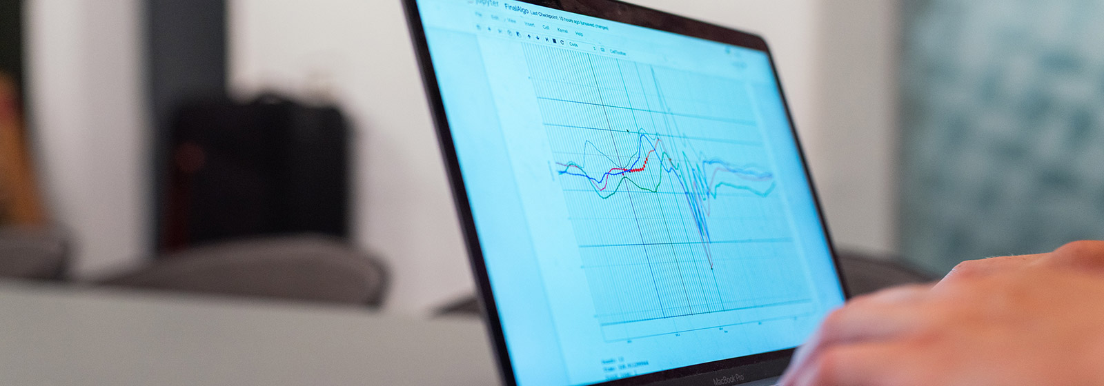 Laptop screen showing graphical display of data