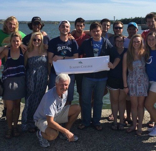 Students pose at Guantanamo Bay during the Winter Term 2015 economics class trip to Cuba