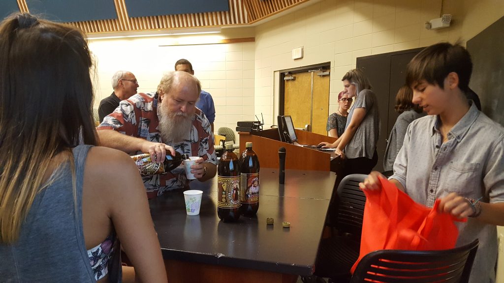 Marina Belotserkovskaya serves up Russian drink as a part of presentation at the third annual Eckerd College Humanities Symposium