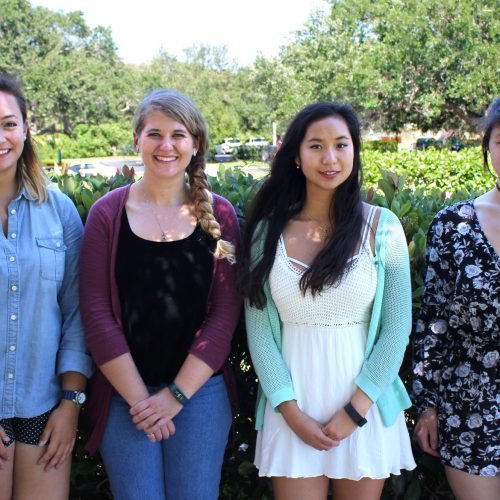 Jessica Heckman, Emily Colson, Lucy Fitzgerald and Abigail Thomas stand outside.