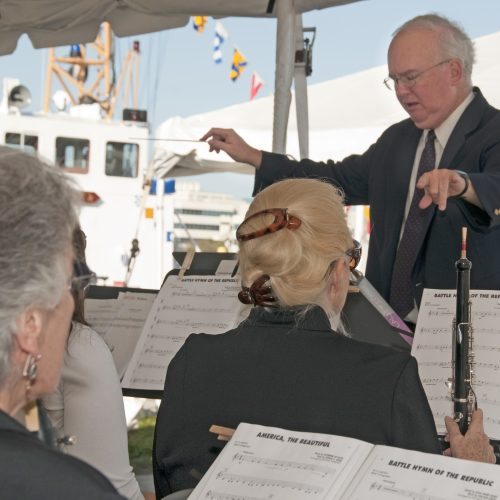 Late Eckerd College Music Professor David Irwin conducts an ensemble playing the Battle Hymn of the Republic.