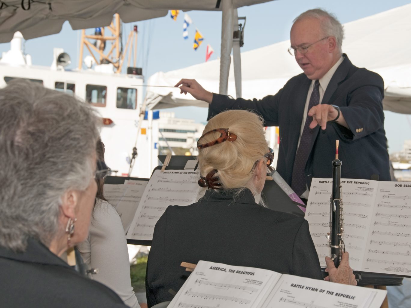 Late Eckerd College Music Professor David Irwin conducts an ensemble playing the Battle Hymn of the Republic.