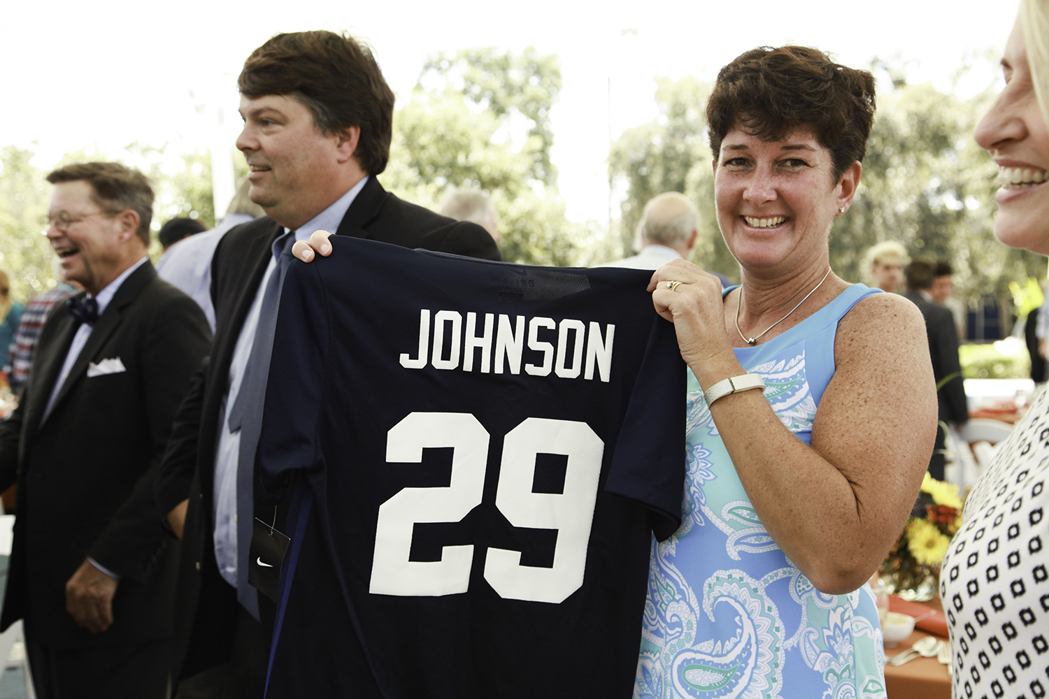 Maureen Johnson displays a soccer jersey made for her son.