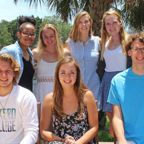 Hollings Scholars seated in front of Fox Pond