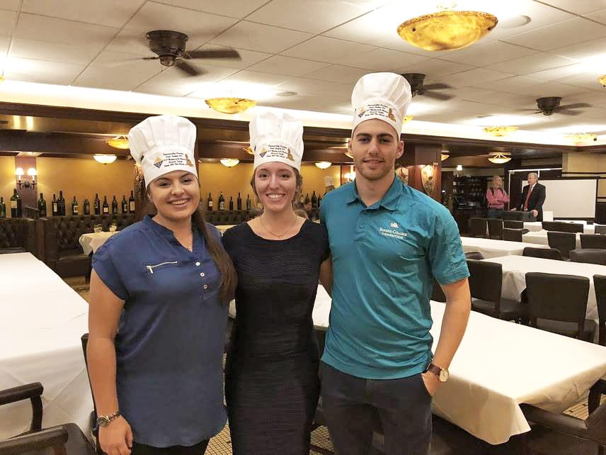 Eckerd students pose after taking second place at the competition