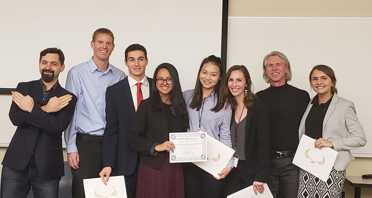 Jenn Burr '19 and team members at the X-Culture Global Symposium