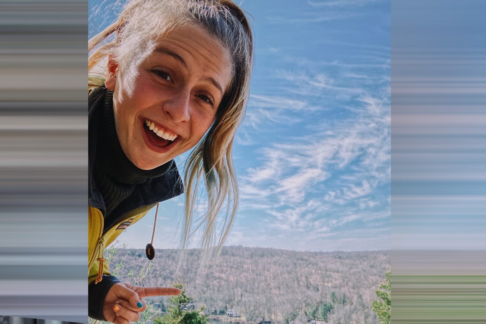 Student hiking in mountains