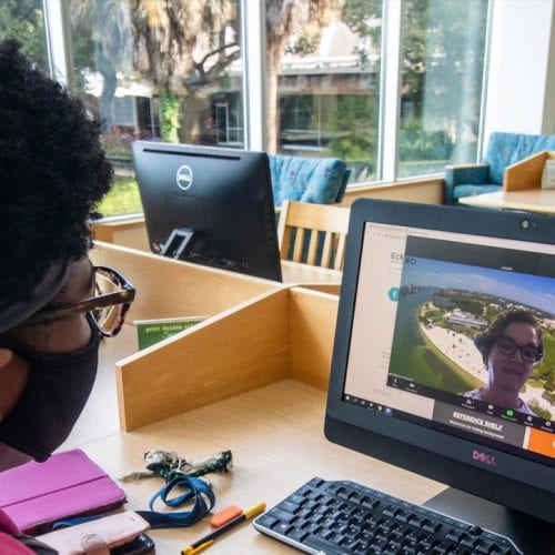 Eckerd College student uses the library's Zoom reference desk