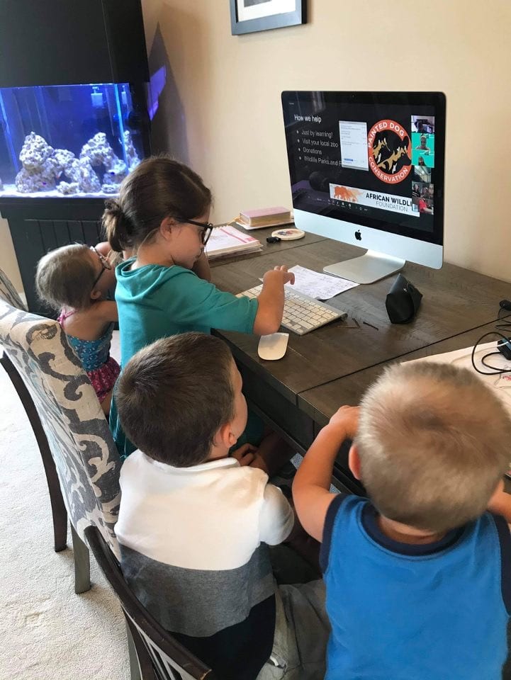 Elementary school aged children participating in WILDWebinars