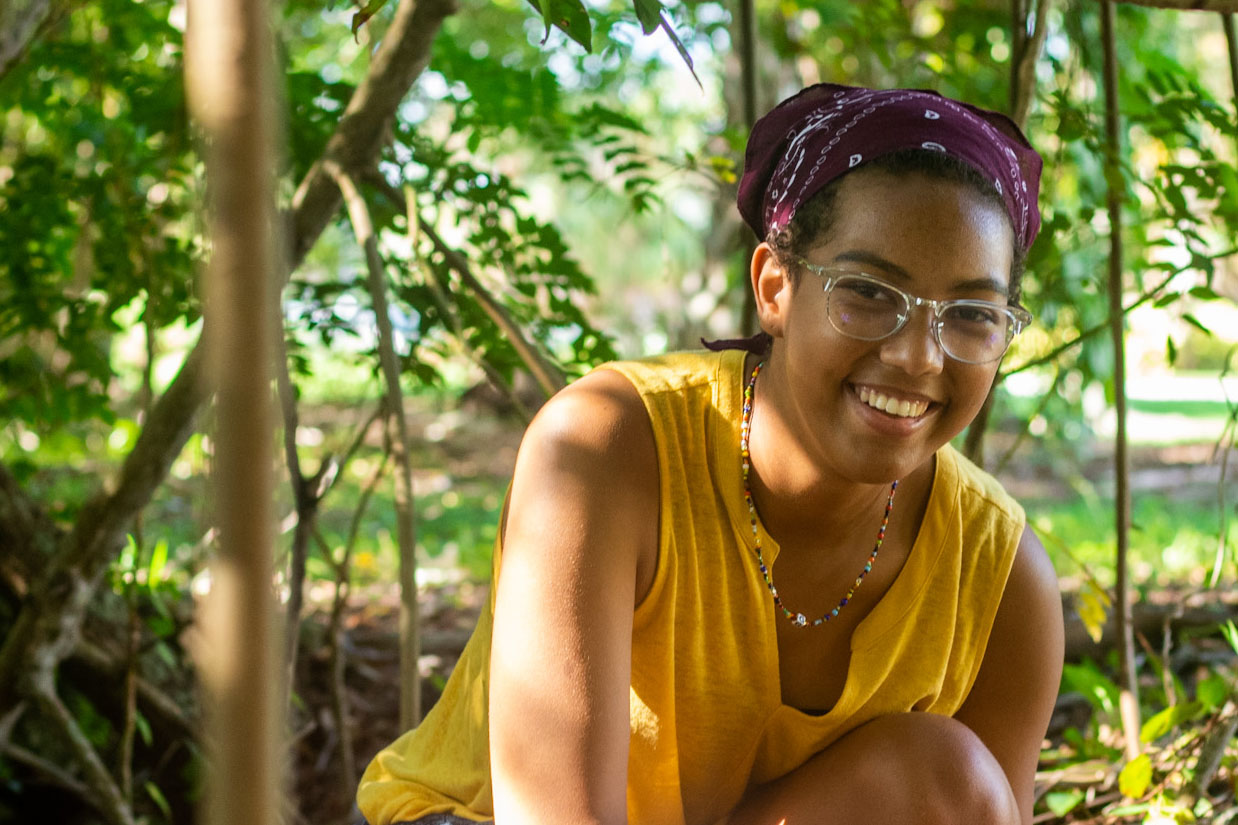 Senior Alex Gordon underneath mangrove branches