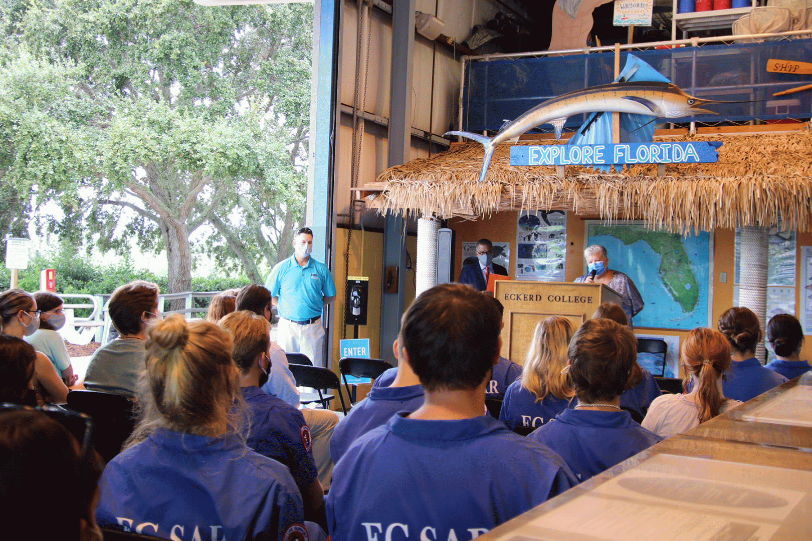 EC-SAR students and others gather in the boathouse to hear about the new award