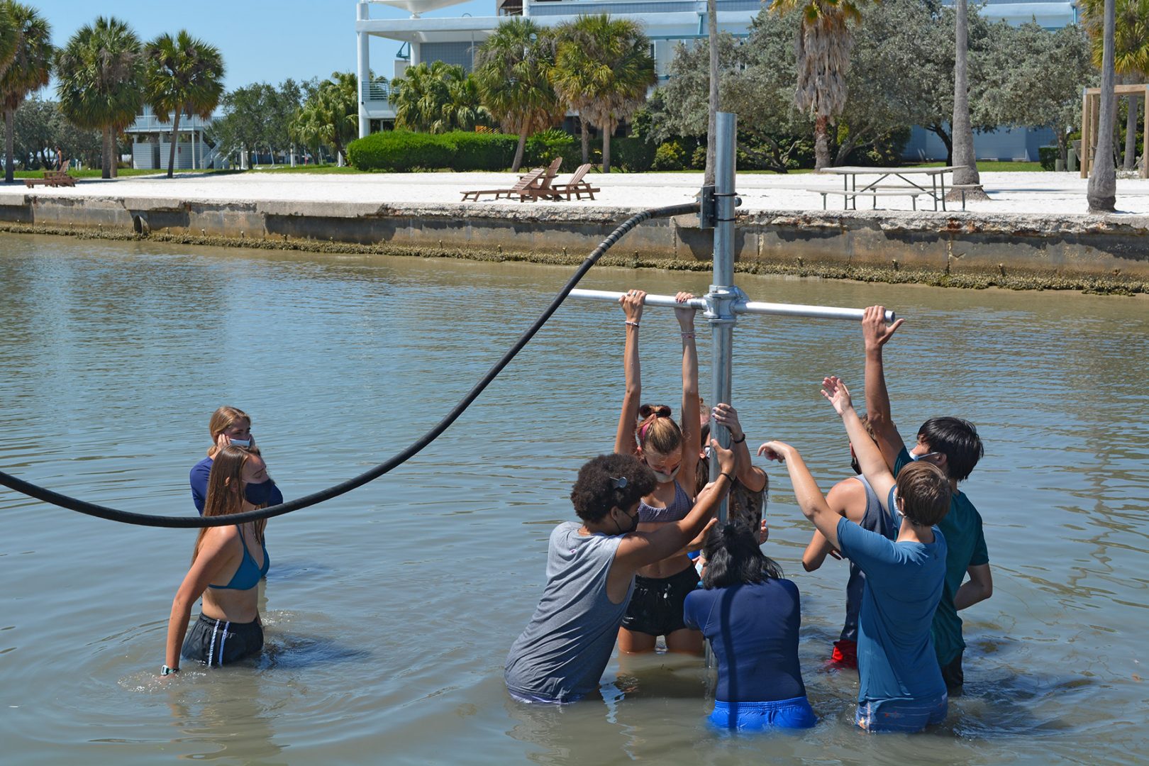 Eckerd College marine science students sample sediment on the seafloor