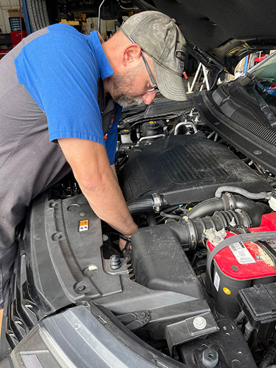 Professor Larkin working on a truck