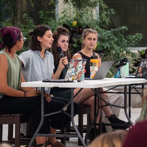 Four female students at a table