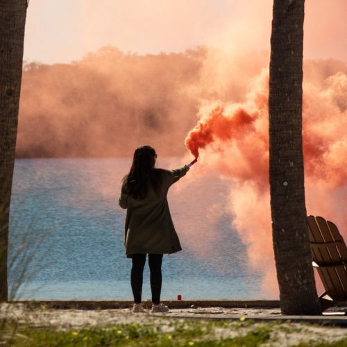 Eckerd student lights a flare on South Beach