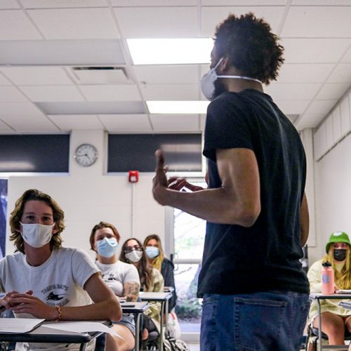 Ronald Porter stands in front of class