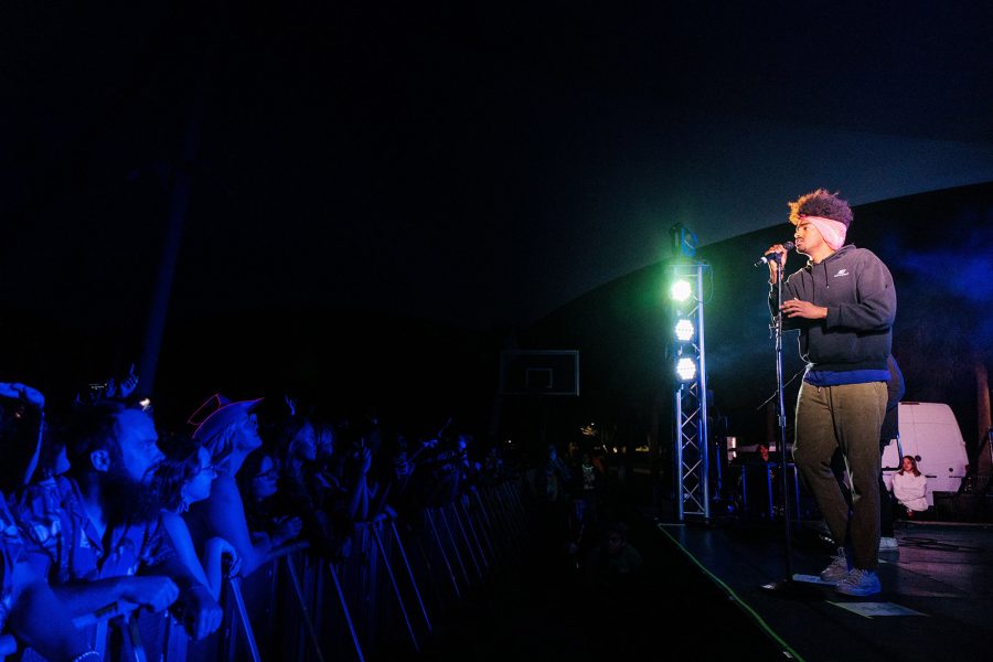 Students cheer on singer on stage