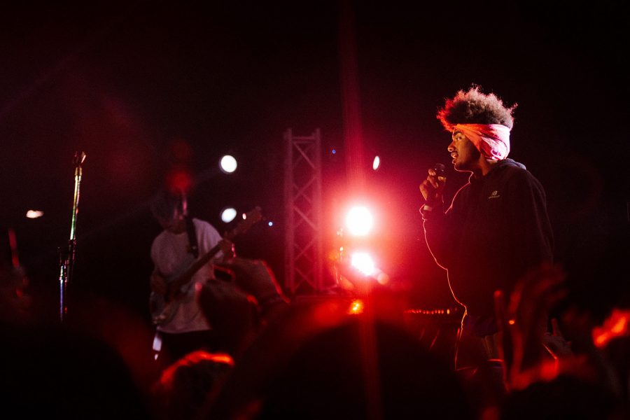 Singer at the microphone with red lights