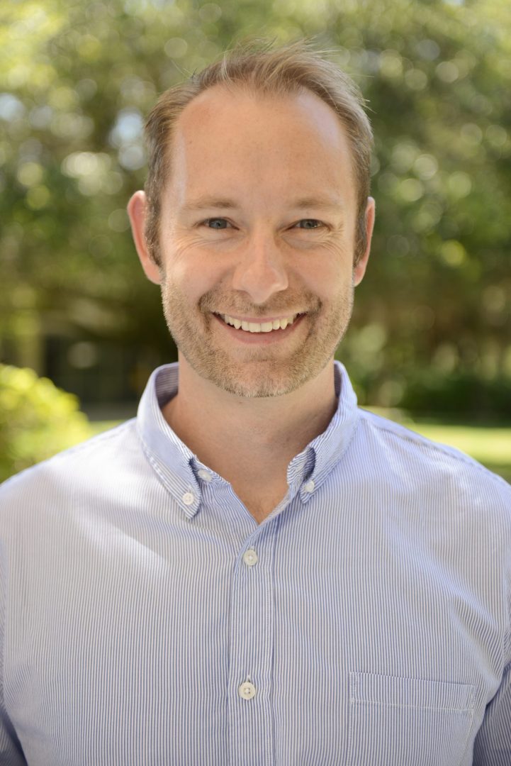 Joseph Larkin smiling outdoors