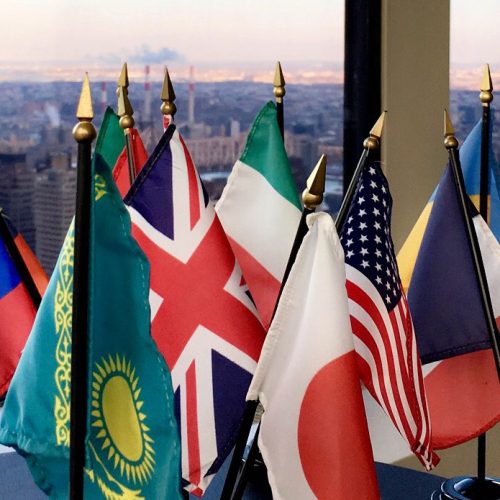 Nation flags on a desk at the United Nations