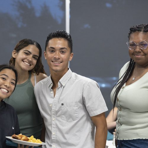 Four students enjoying the event