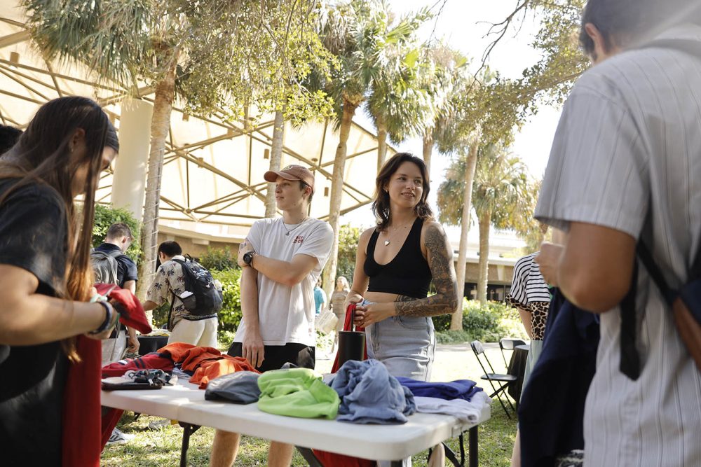 Students making bags out of used t-shirts