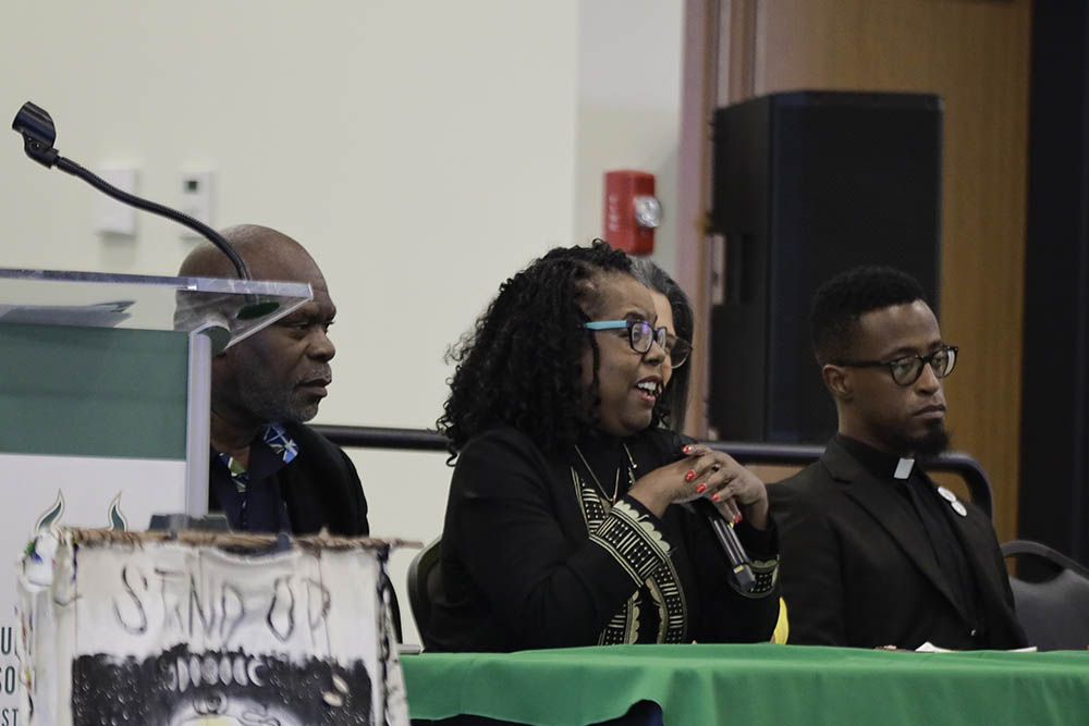 Panelists talking at table