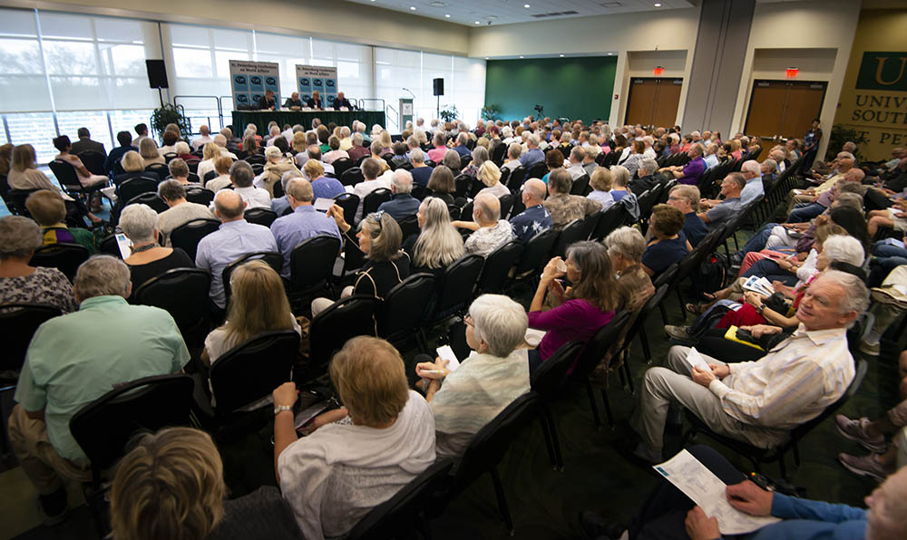 Large crowd listens to lecture