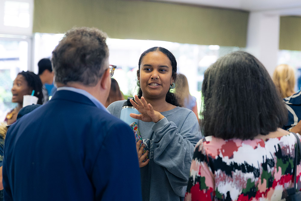 Student speaks with president and his wife