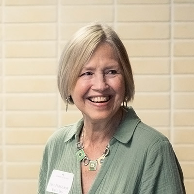 Woman wearing name tag labelled "Ferguson"