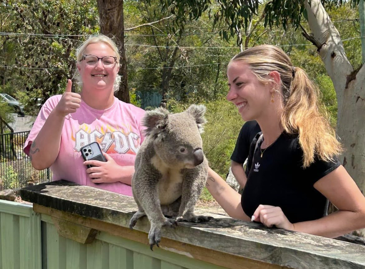 Students with a koala