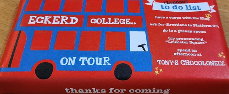 Chocolate bar with text "ECKERD COLLEGE ON TOUR" on the wrapper
