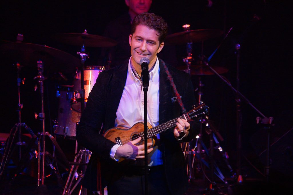 Musician on stage playing ukelele