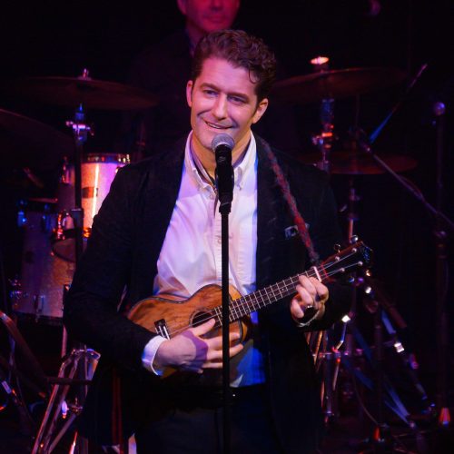 Musician on stage playing ukelele