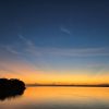 A vibrant orange sky at dusk in Vale do Javari.