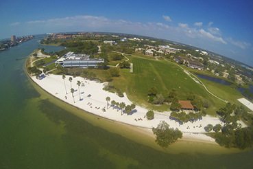 Aerial view of campus with beach