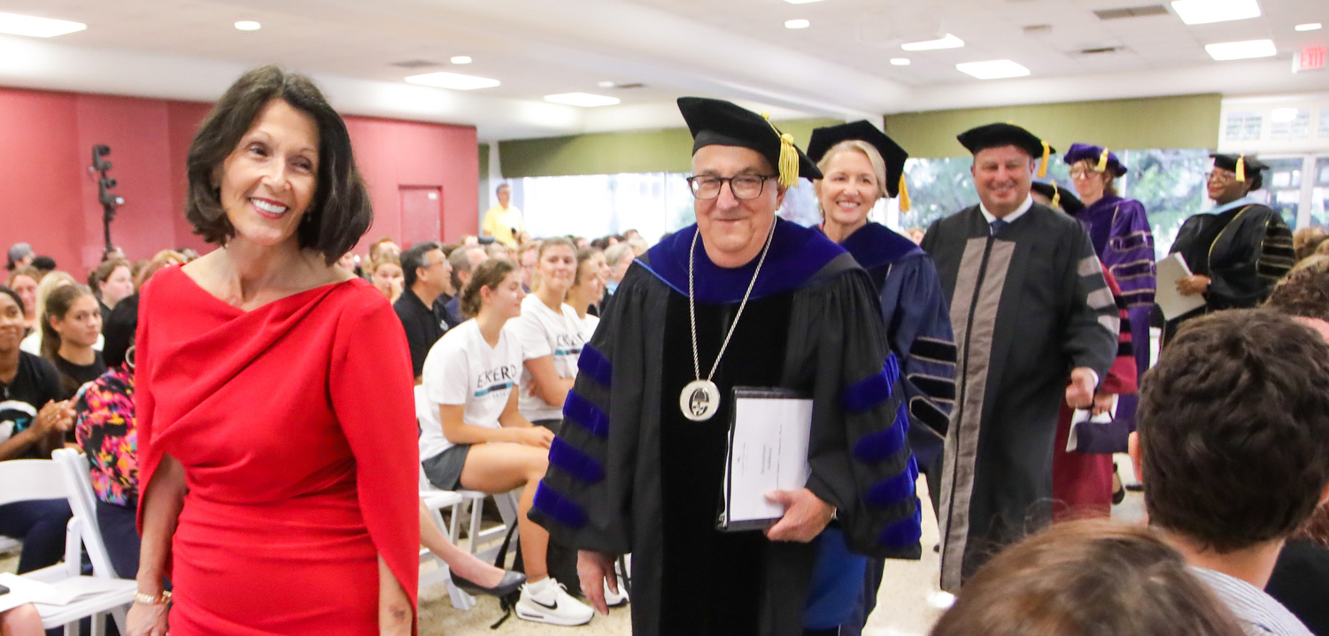 President Annarelli processes down the aisle with his wife and trustees
