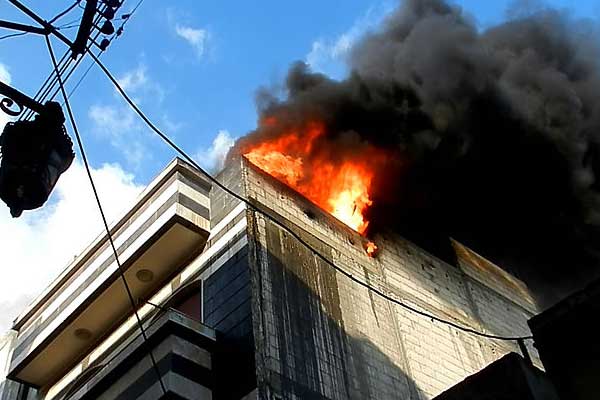 Building on fire with smoke