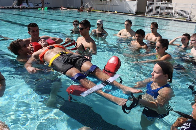 Eckerd College Emergency Response Team students perform a drill in the pool
