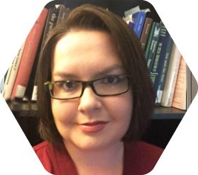 Lisa Miller in front of book shelf